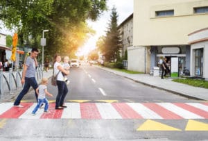 graphicstock young family with two boys in the city walking on a crosswalk SRZgumPaZ