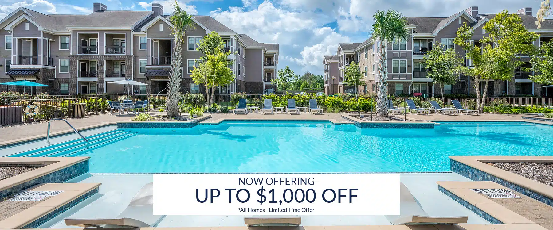 Swimming pool at the Preserve at Baywood apartment complex with lounge chairs on the deck and promotional text reading “Now offering up to $1,000 off all homes - limited time offer.”