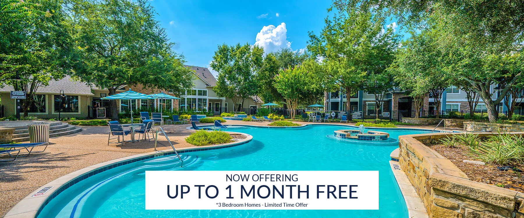 Outdoor pool area at Preserve at Colony Lakes apartment complex with lounge chairs, trees, and a sign advertising up to one month free on three-bedroom homes for a limited time.