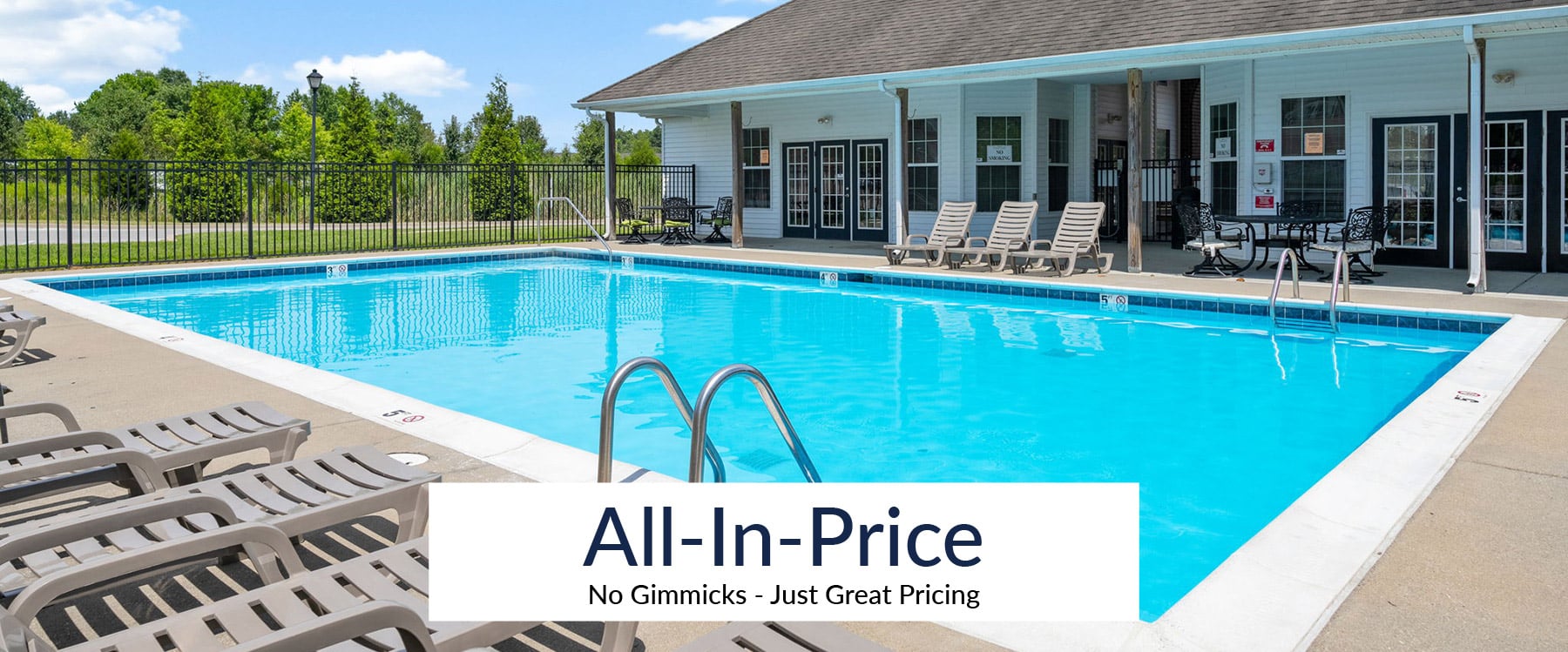 Outdoor swimming pool with lounge chairs around the deck at Reserves of Thomas Glen, next to a building on a sunny day. Text overlay reads "All-In-Price: No Gimmicks - Just Great Pricing.